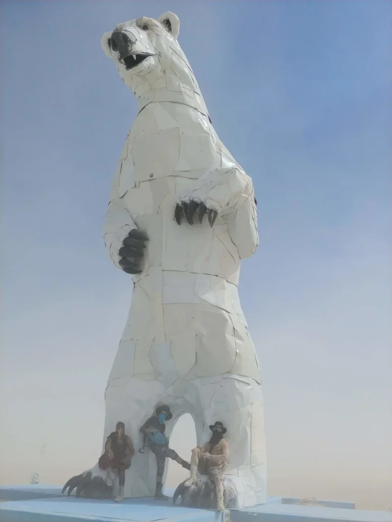Chad Reilly and friends with white bear at Burning Man 2018.